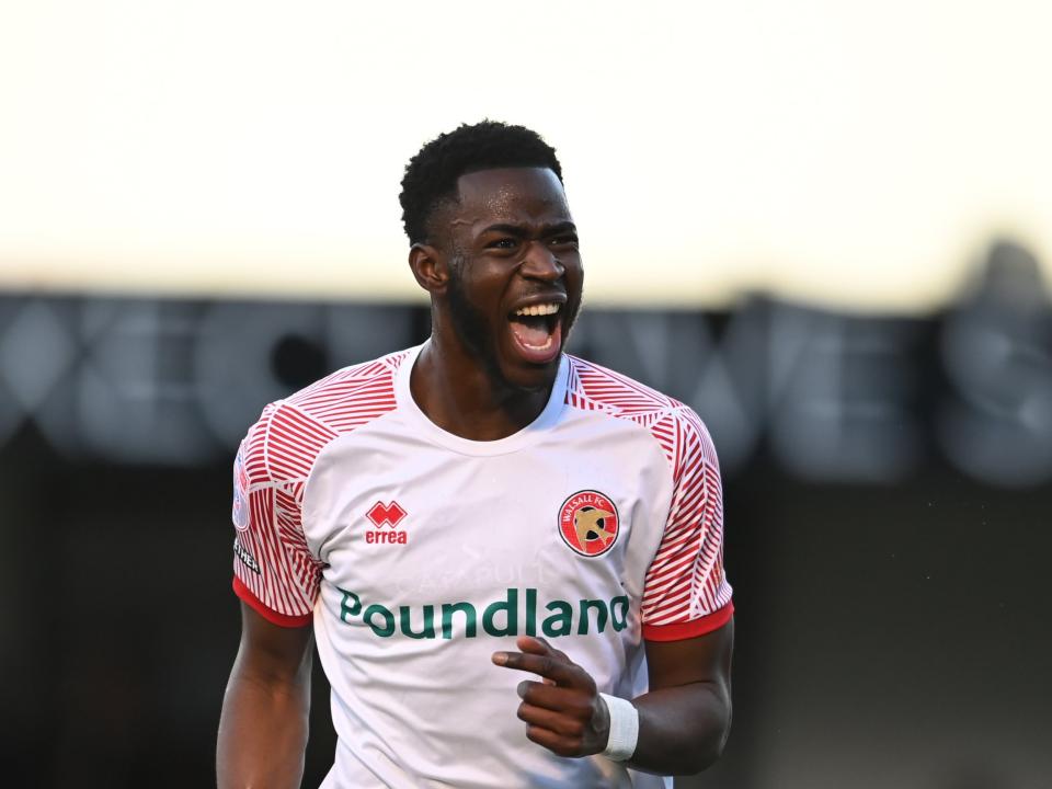Mo Faal celebrates scoring his first goal for Walsall up at Harrogate Town