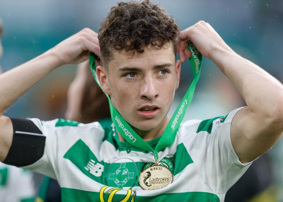 Mikey Johnston with his league winners medal in 2018/19