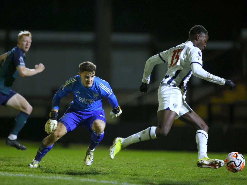 An image of Eseosa Sule scoring against Arsenal
