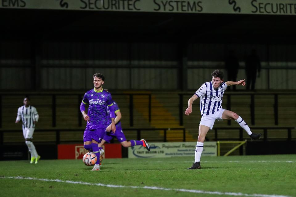 Matt Richards heads towards goal in the Premier League Cup clash with Reading