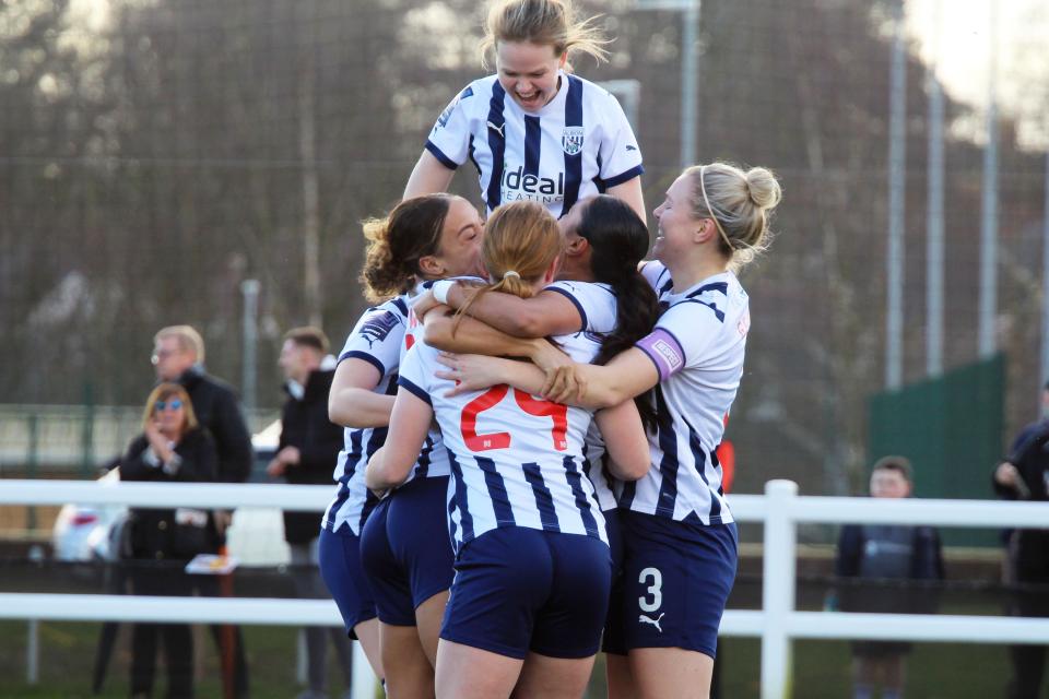 Albion Women celebrate, in home colours.