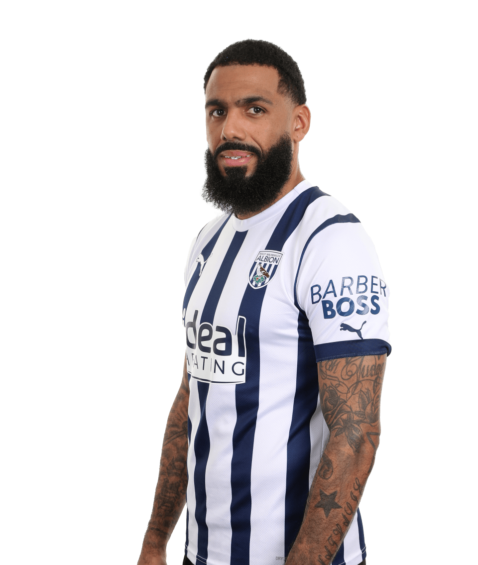 A photo headshot of Yann M'Vila in the 2023/24 home shirt