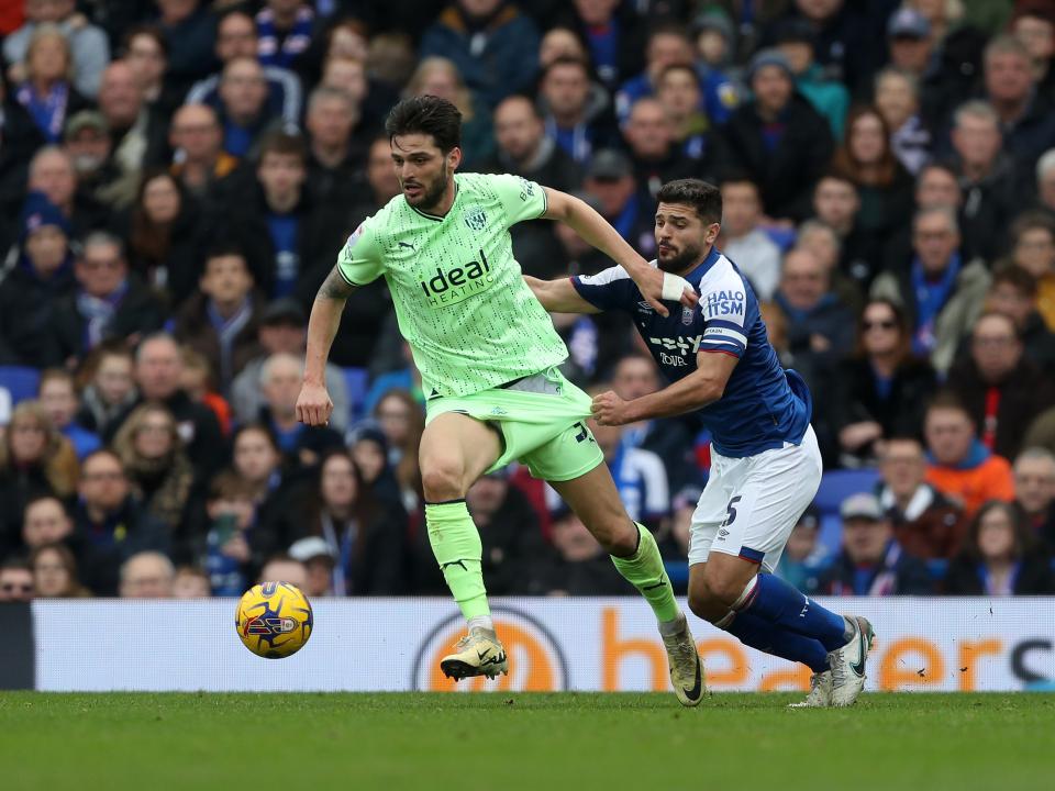 An image of Okay Yokuslu on the ball against Ipswich