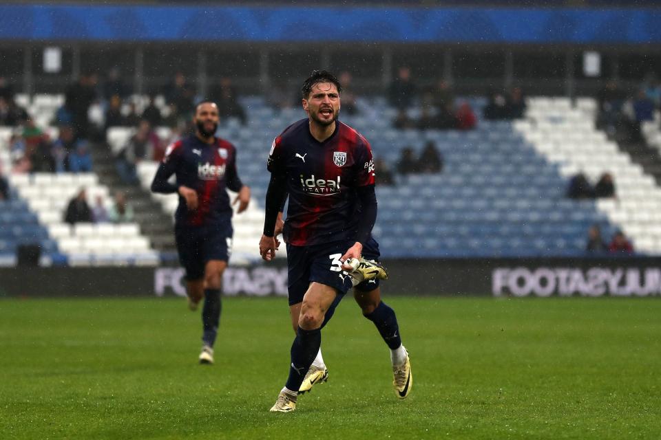 Okay Yokuslu celebrates scoring against Huddersfield 