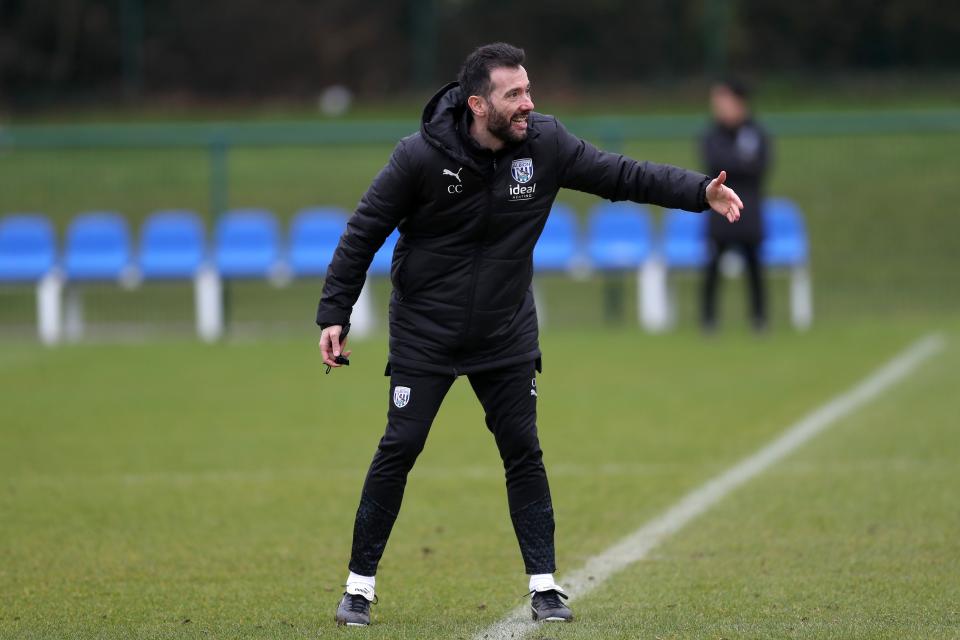 Carlos Corberán coaching his players on the training pitch