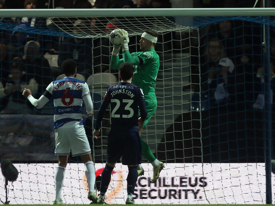 A photo of Alex Palmer claiming a cross during Albion's away game v QPR
