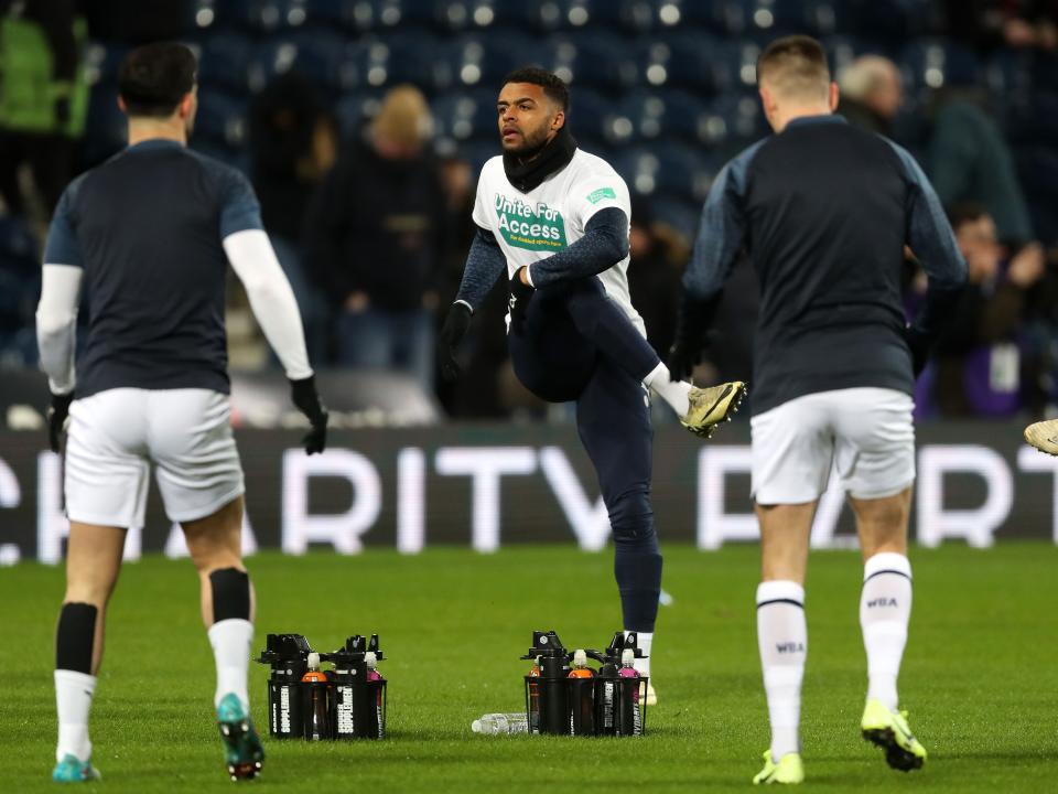 An image of Darnell Furlong warming up against Coventry