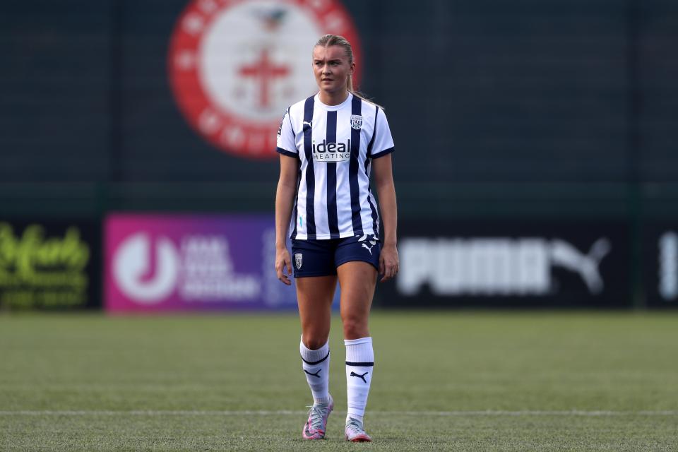 Taylor Reynolds in action for Albion Women wearing the home kit
