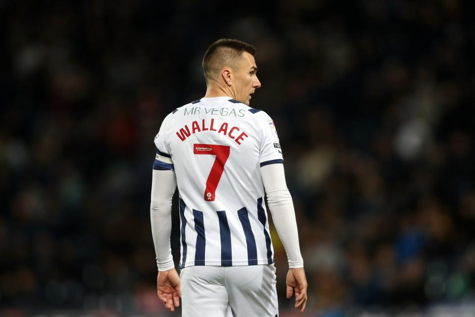 Jed Wallace looking to his right with his name and number showing on the back of his shirt 