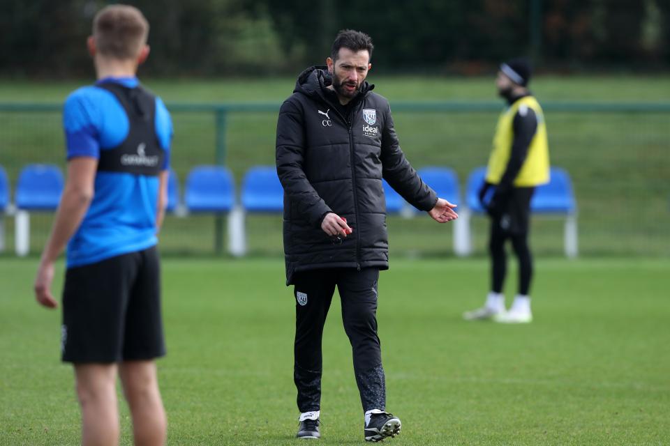 Carlos Corberán coaching his players on the training pitch 
