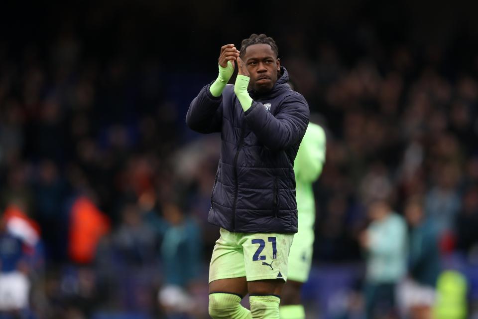 Brandon Thomas-Asante applauds Albion fans after a match