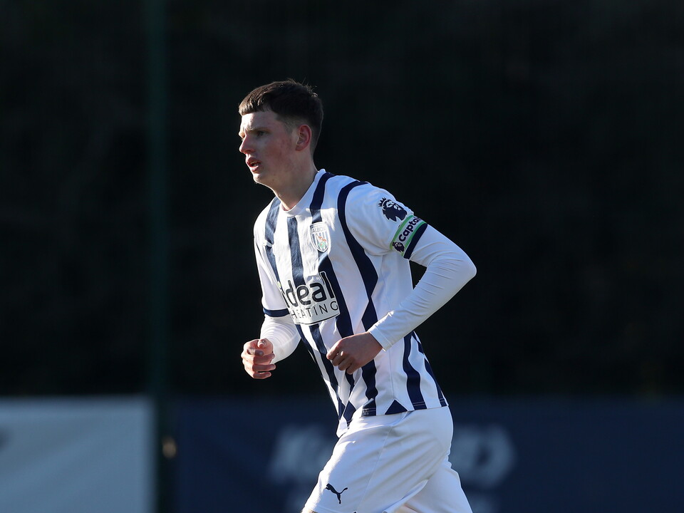 A photo of academy defender Reece Hall in the 23/24 home kit