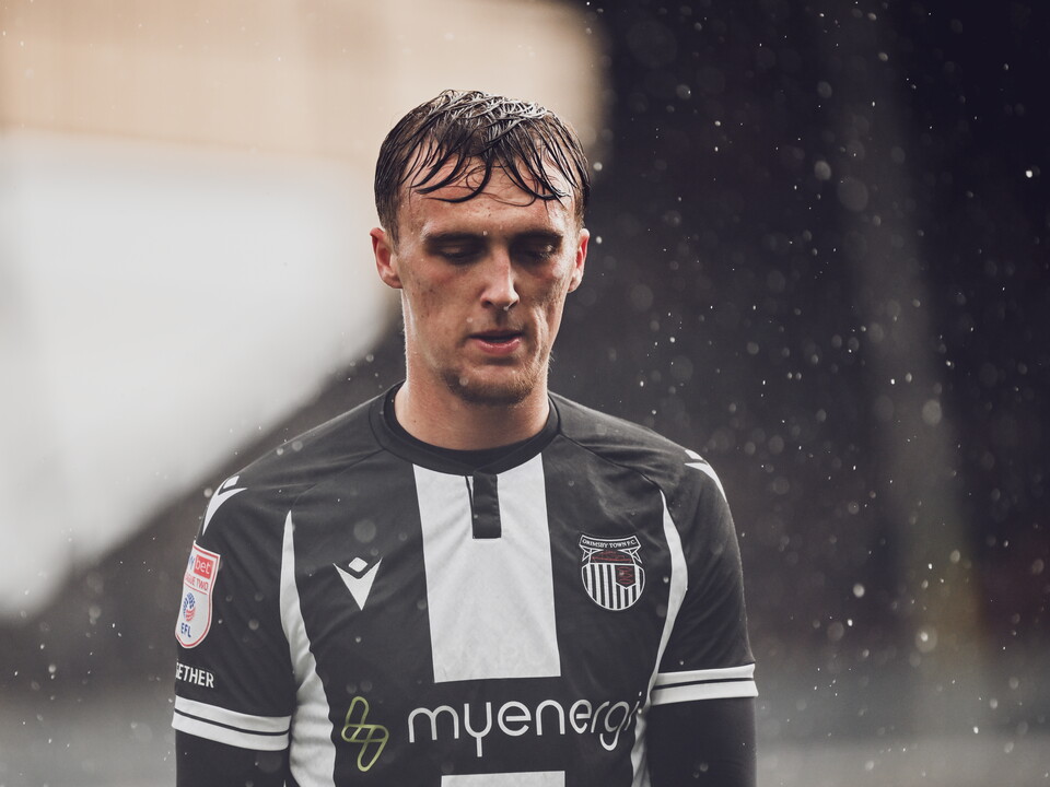 A photo of Jamie Andrews in Grimsby Town's black-and-white home kit