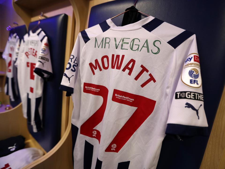 An image of Alex Mowatt's shirt hanging up in the dressing room