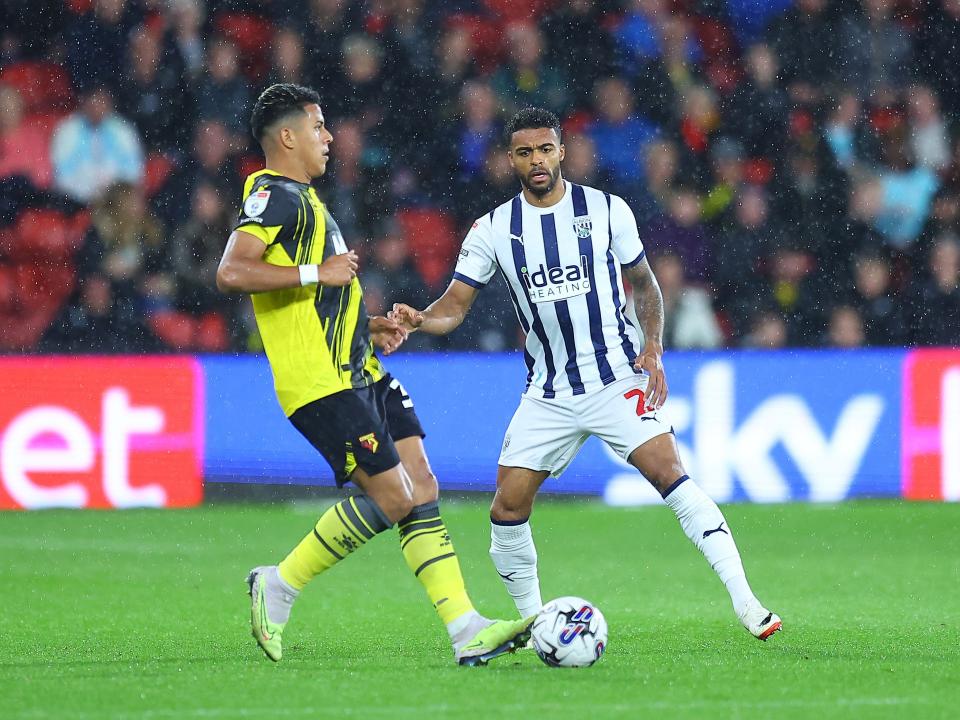 Darnell Furlong on the ball against Watford at Vicarage Road in the rain in September 2023