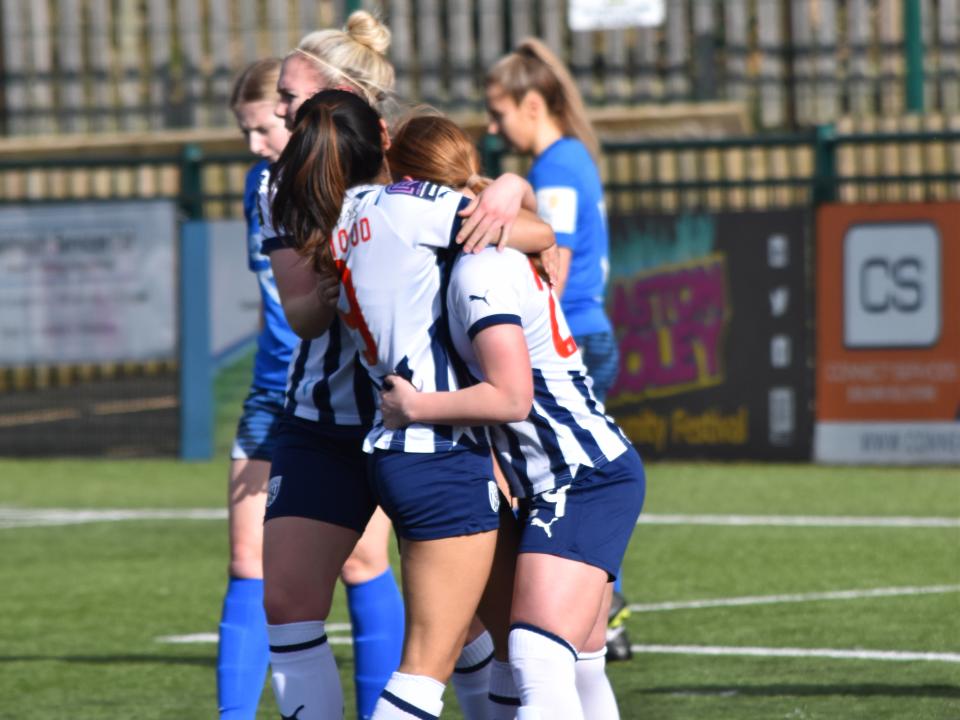 An image of Maz Mahmood and Delphi Cole celebrating a goal against Halifax