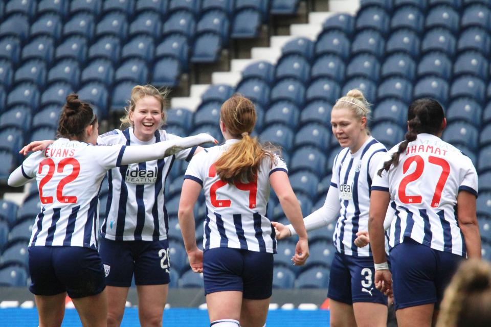 Phoebe Warner celebrates in home Albion colours.