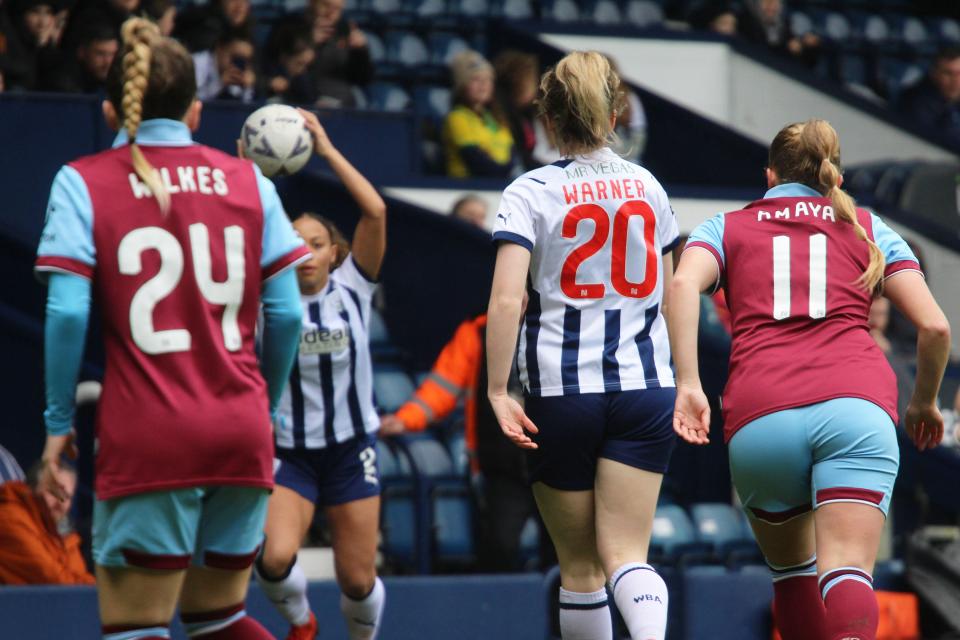 Phoebe Warner in action, in home Albion colours.