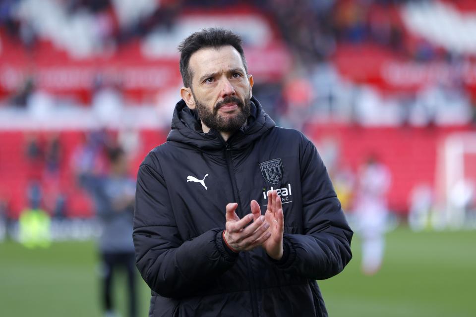 Carlos Corberán applauds Albion fans after the game against Stoke City
