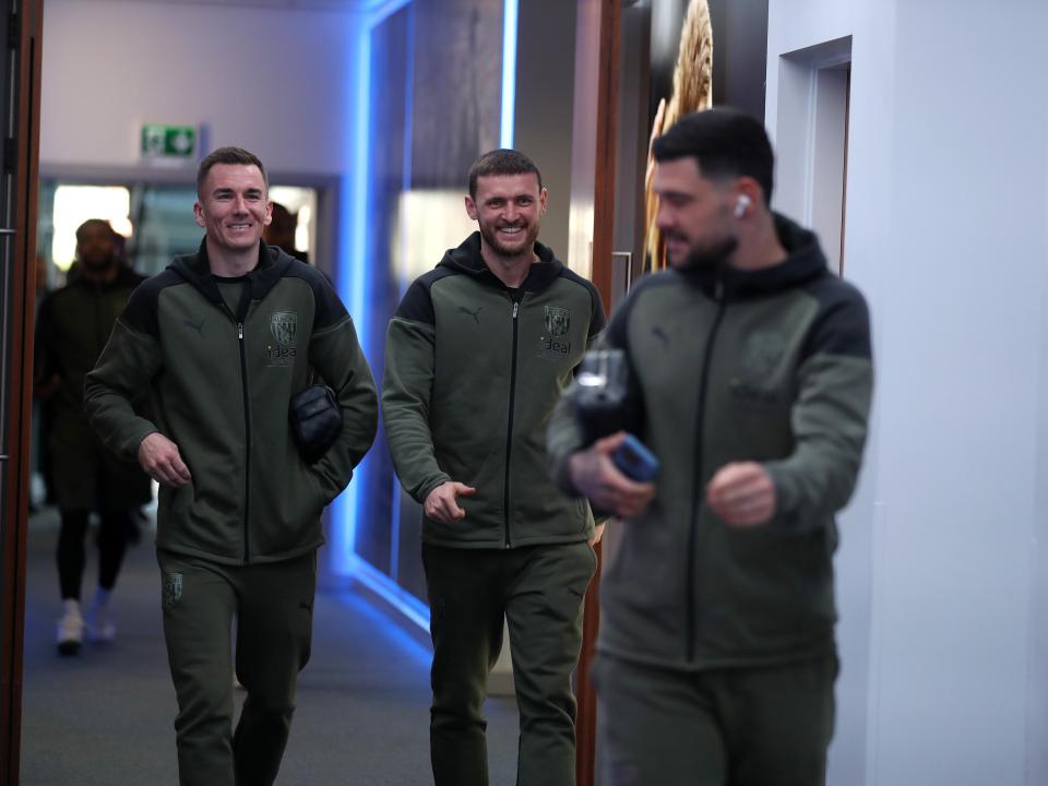 An image of Alex Mowatt, Jed Wallace and John Swift arriving at Leicester's King Power Stadium