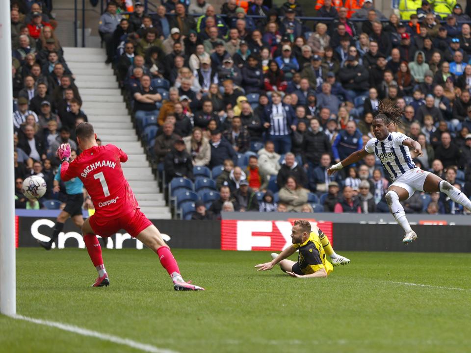 An image of Brandon Thomas-Asante scoring against Watford