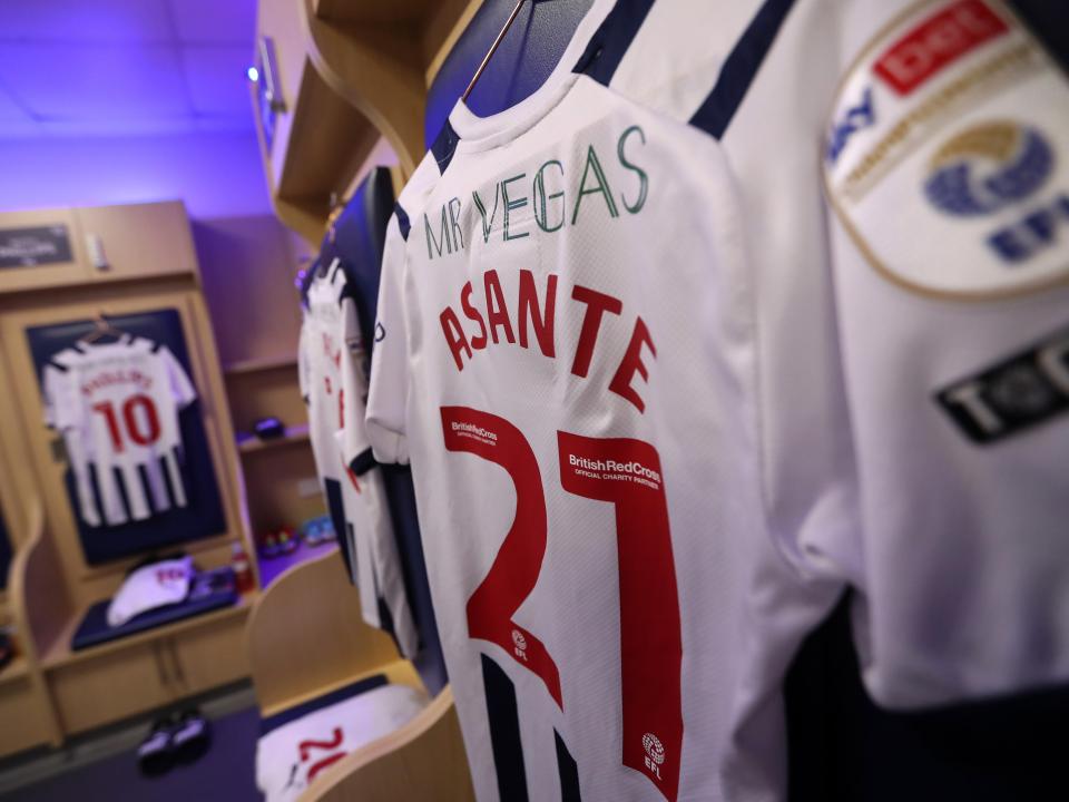An image of Brandon Thomas-Asante's shirt hanging in the dressing room