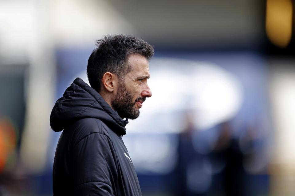 Carlos Corberán from the side watching an Albion game