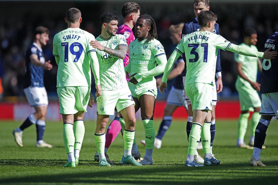 John Swift, Alex Mowatt, Brandon Thomas-Asante and Tom Fellows wearing the lime green away kit at Millwall