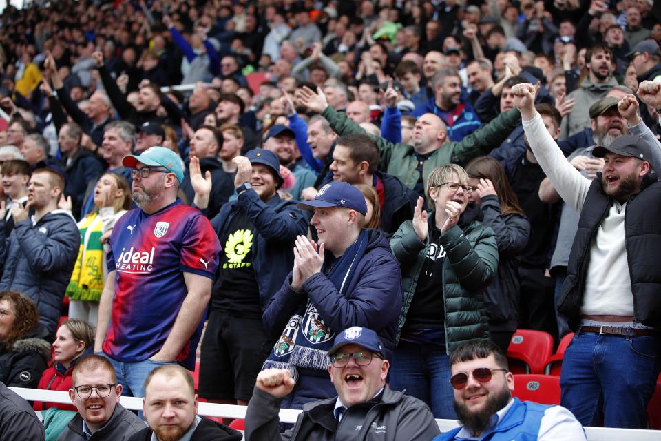 A general view of Albion supporters cheering their side on at a game