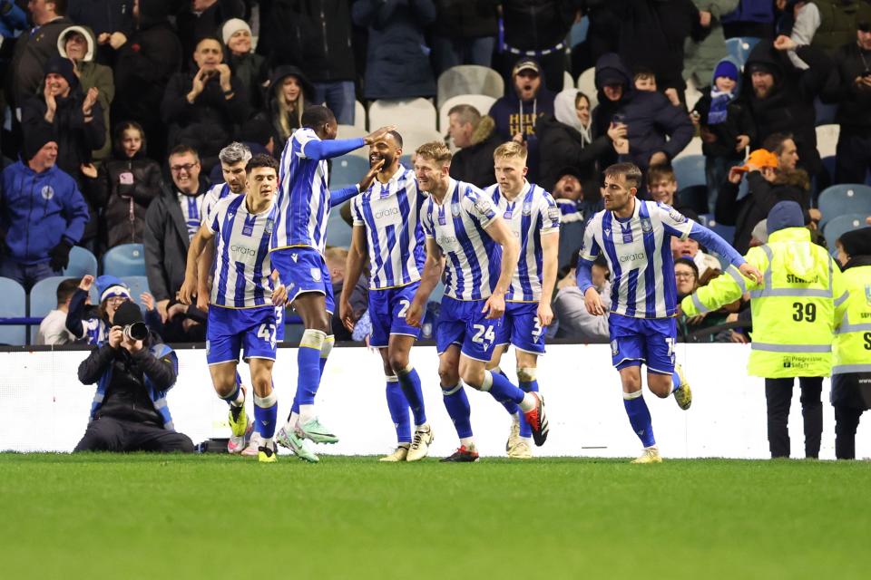 Sheffield Wednesday players celebrate scoring against Norwich City at Hillsborough 
