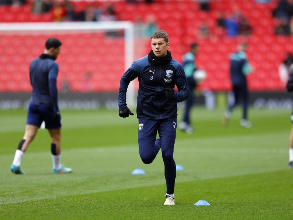 An image of Conor Townsend warming up at Stoke