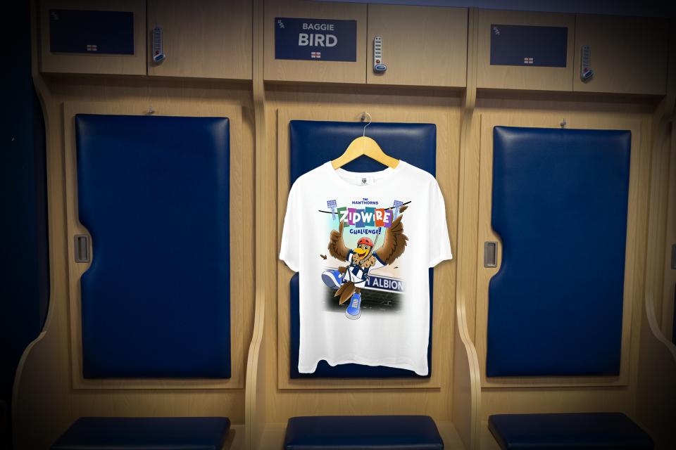 ZIpwire The Hawthorns t-shirt, hanging up in the dressing room under Baggie Bird's locker badge.