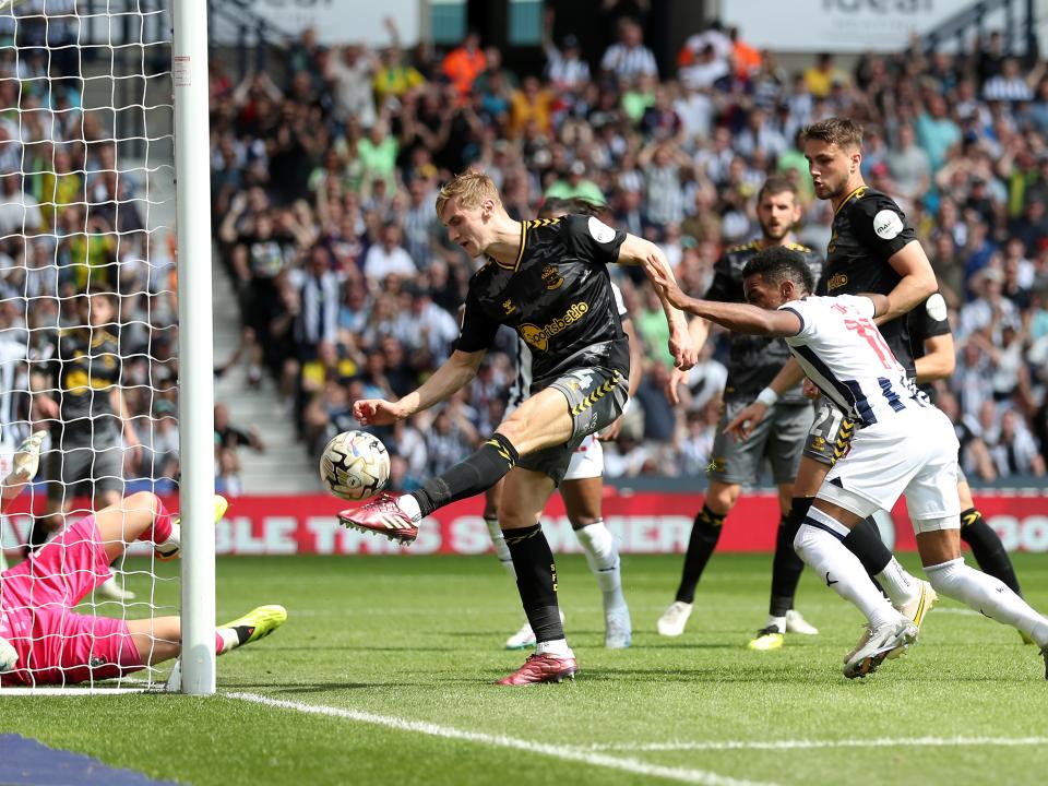 An image of Grady Diangana's header being saved by Alex McCarthy