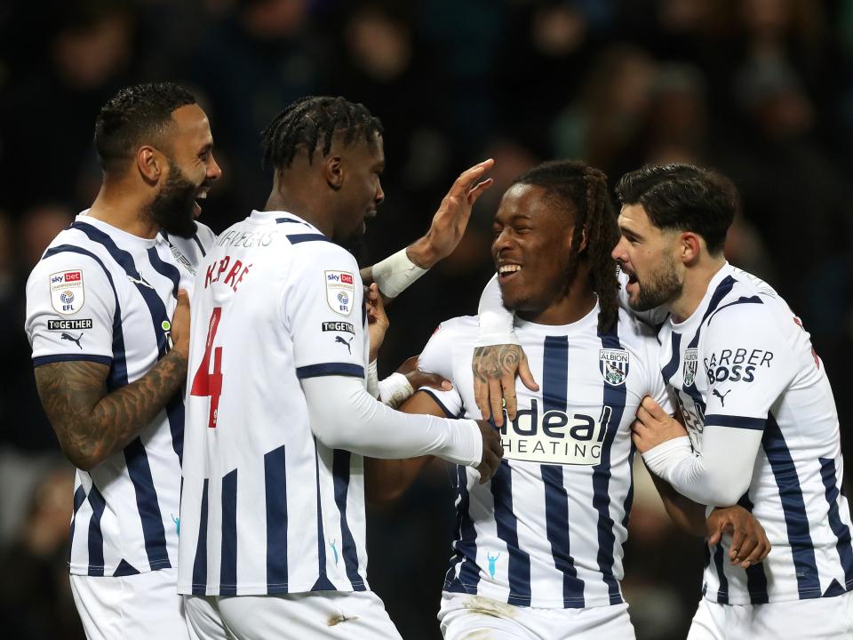 An image of Kyle Bartley, Cedric Kipre, Brandon Thomas Asante and Alex Mowatt celebrating a goal