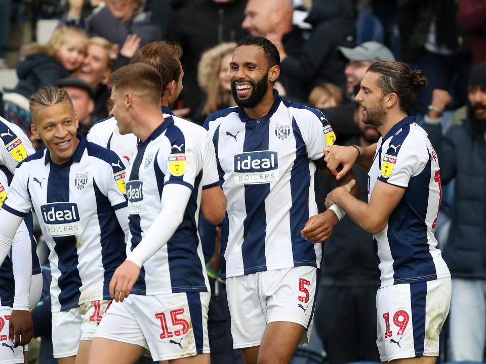 Kyle Bartley celebrates scoring for Albion against Reading in 2018 at The Hawthorns with several team-mates 