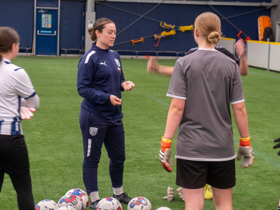 Anna Miller gives instructions to camp participants during The Albion Foundation's half-term Whitsun Week camp.