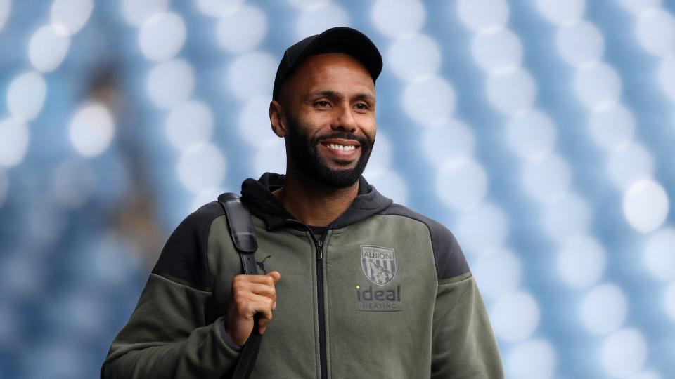 Kyle Bartley arriving at a game in his Albion tracksuit 