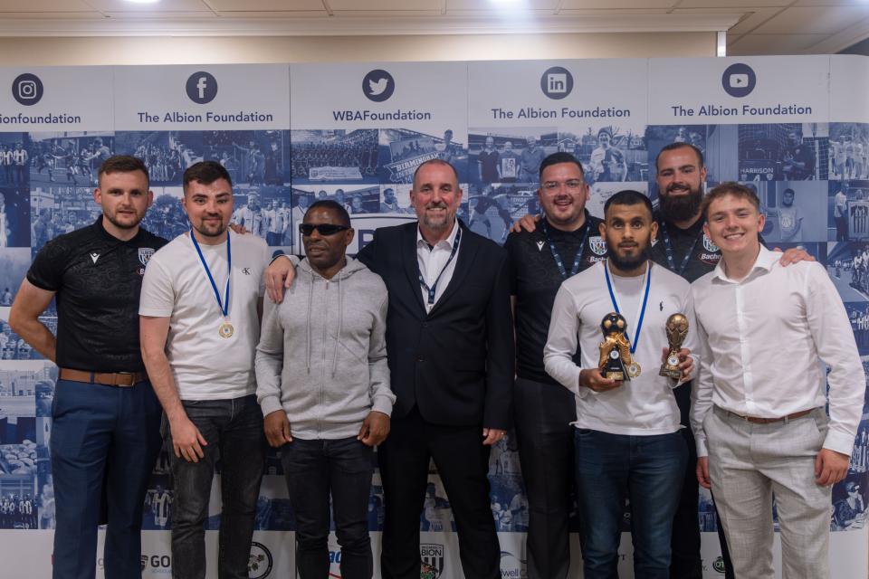 Albion's Blind team have a photo at the Disability Awards Evening.