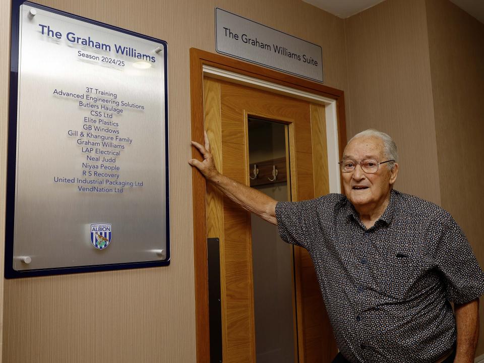 Graham Williams stood outside the Graham Williams Suite at The Hawthorns