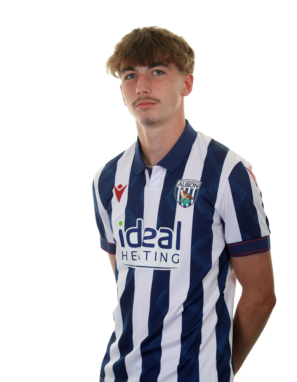 A photo of Alfie Maughan in the 2024/25 home kit