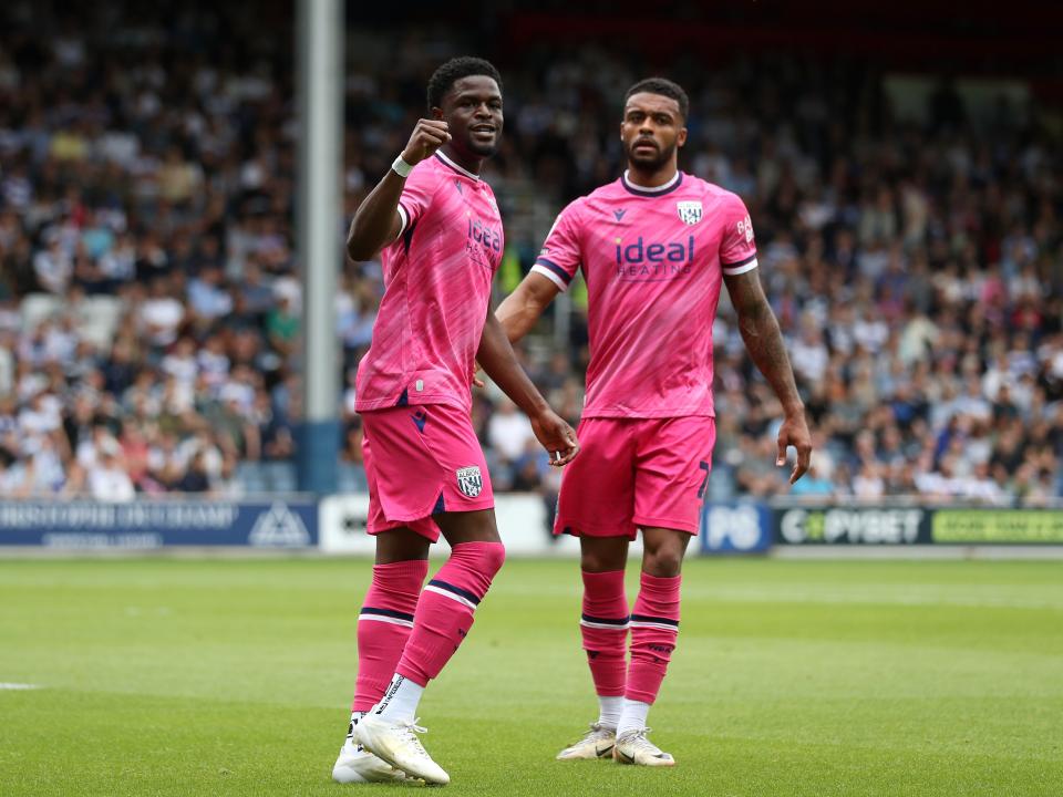 Josh Maja celebrates with Darnell Furlong