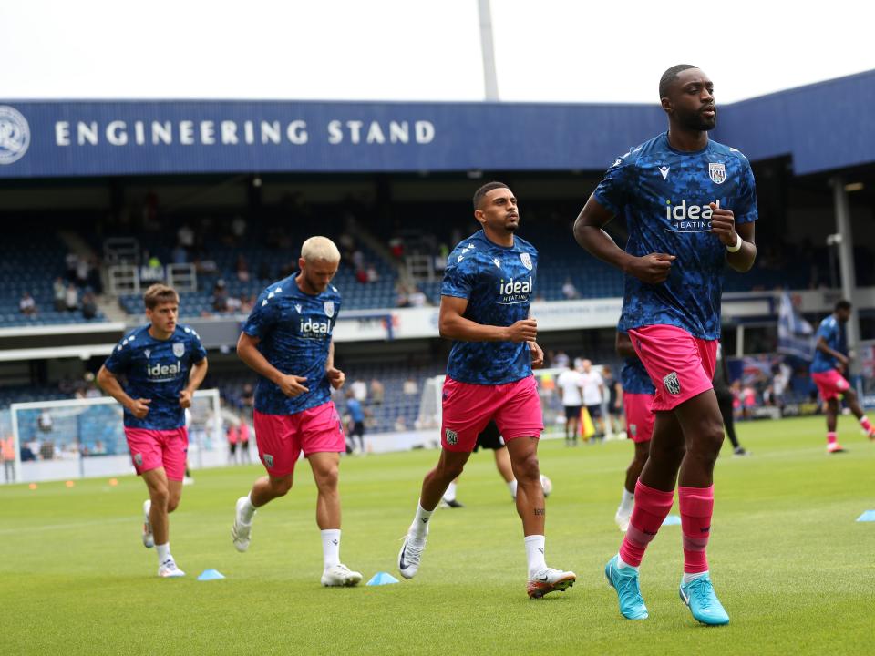An image of Semi Ajayi, Karlan Grant, John Swift & Tom Fellows warming up