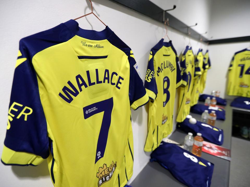 An image of Jed Wallace's shirt hanging in the dressing room