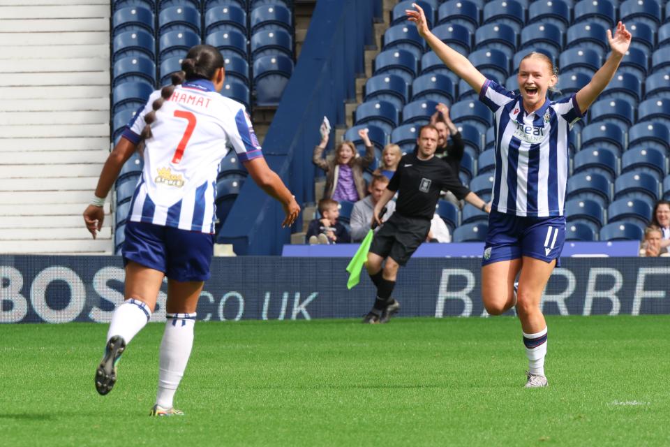 Marli Rhodes-Andrews and Simran Jhamat celebrate.