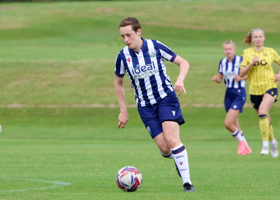 Alisha Miller in action, in home colours.