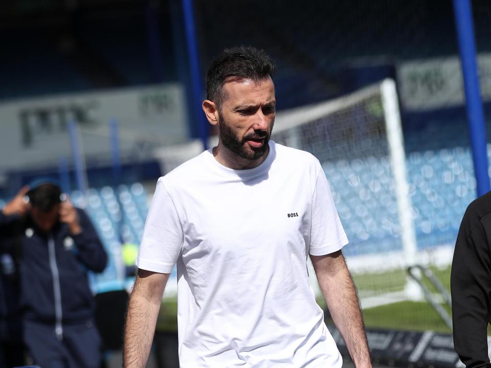 An image of Carlos Corberán arriving at Portsmouth's Fratton Park