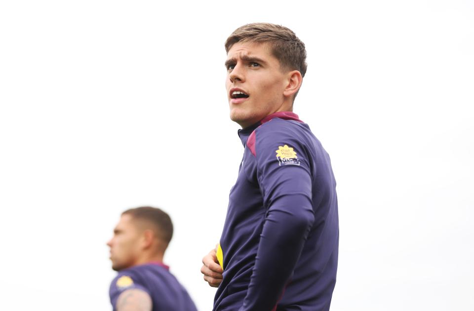 Tom Fellows looking up while in the middle of an England U21 training session