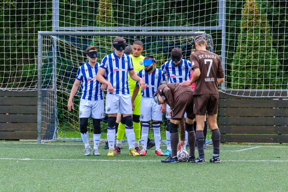 Albion Blind line-up to block a free-kick.