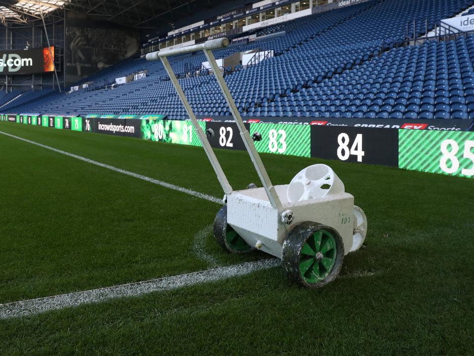 An image of the lines being painted on the pitch at The Hawthorns