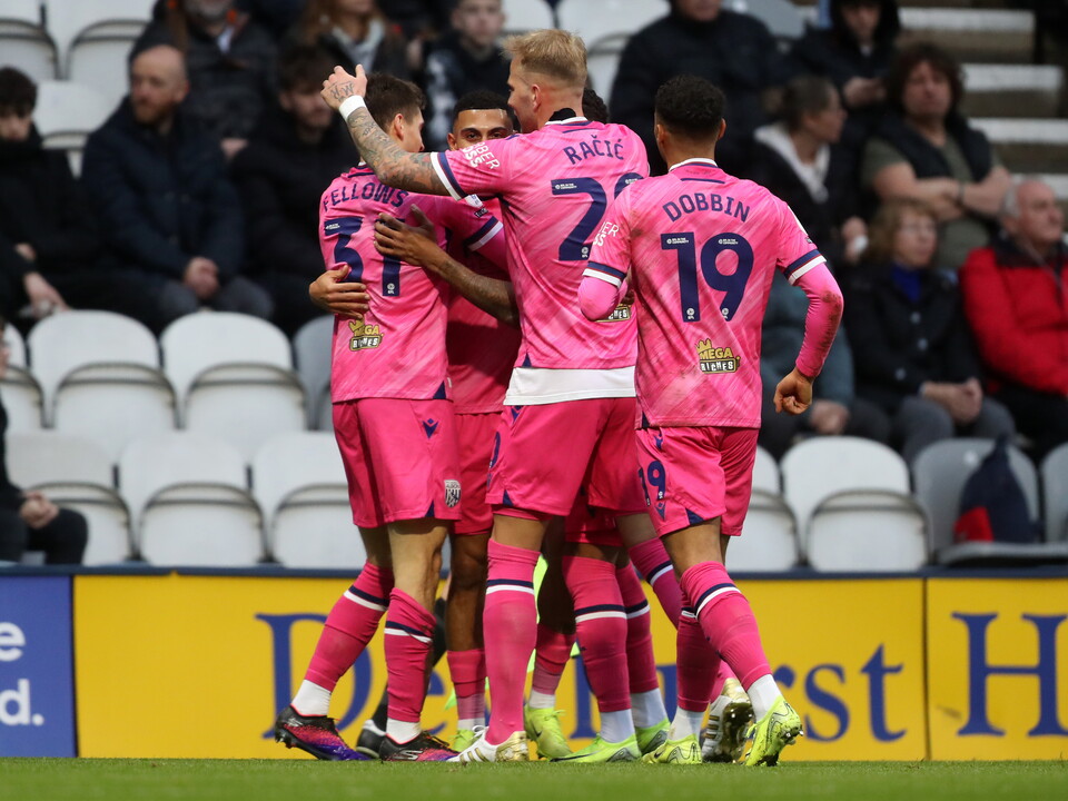 An image of Karlan Grant and his teammates celebrating the opening goal against Preston